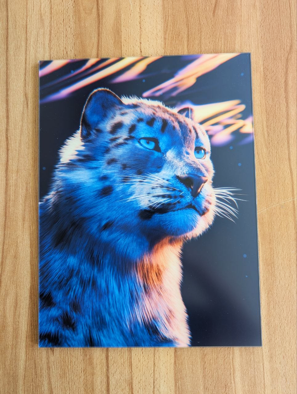 A gallery print of a 3D artwork made in Blender. It features a snow leopard in 3/4 view. The overall colours are dark but with vibrant highlights.