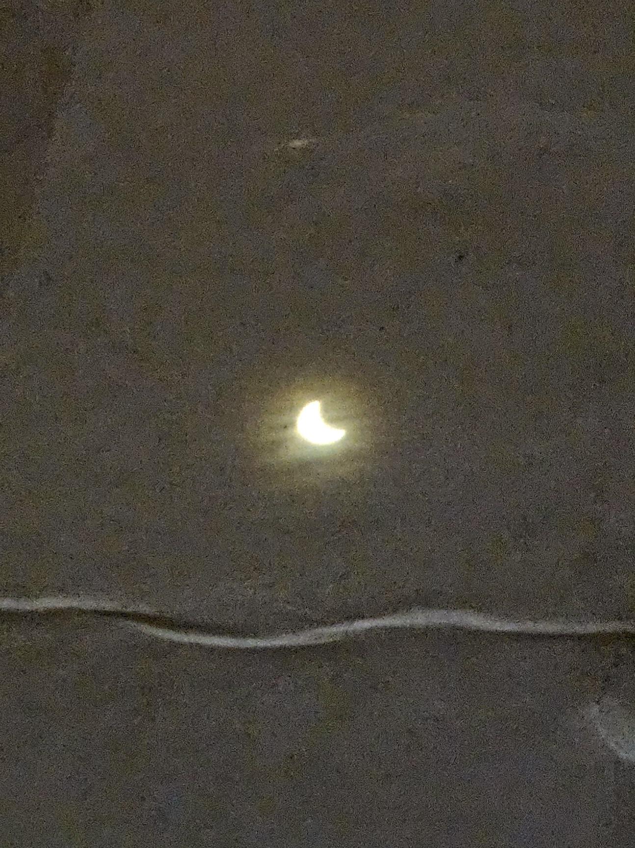 Sun in eclipse image on cardboard