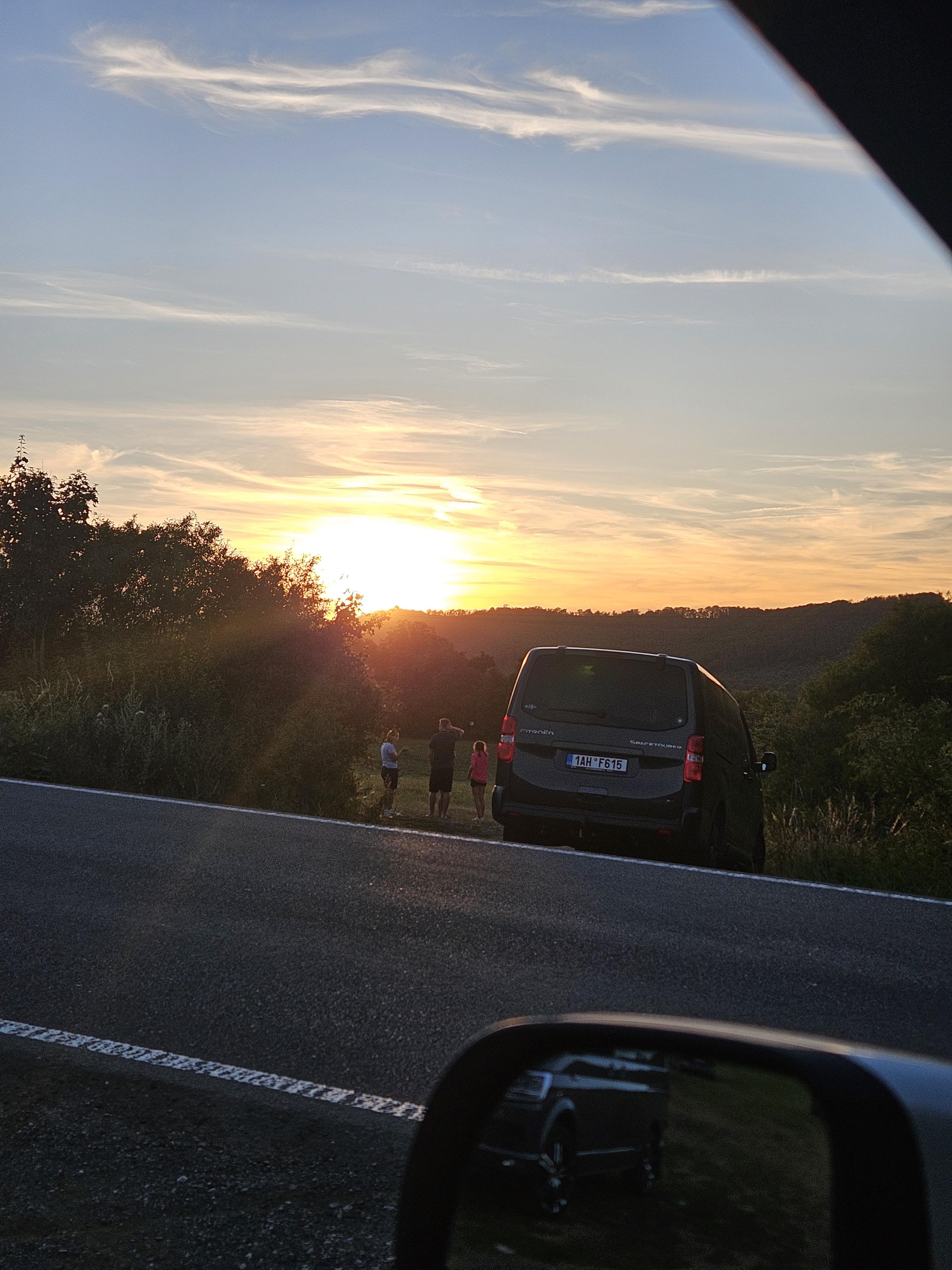 Family looking at sunset