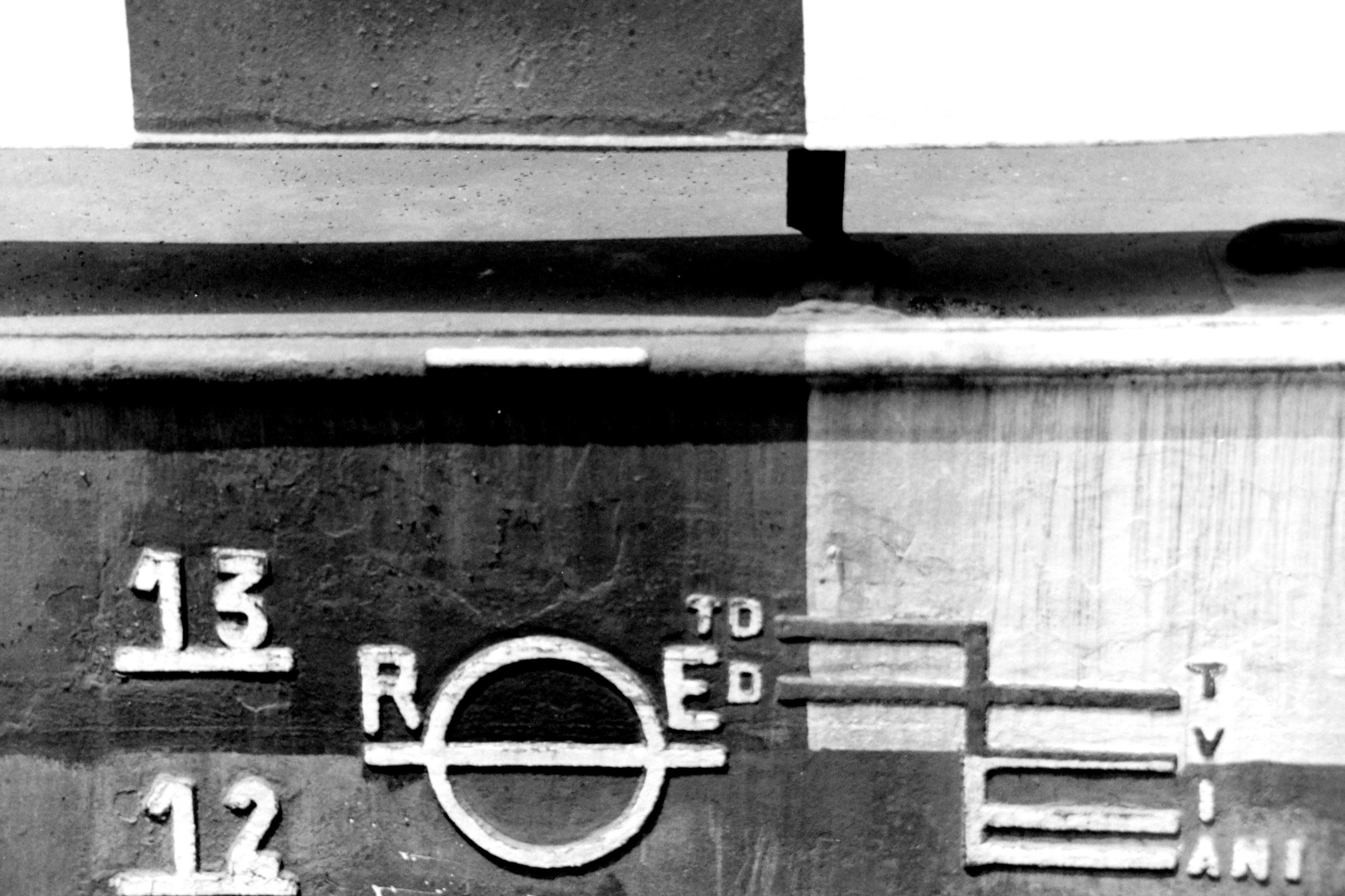 The load line mark, also known as Plimsoll line, indicates the legal limit to which a ship may be loaded for specific water types and temperatures in order to safely maintain buoyancy.
What the Markings Mean:
The Circle with a Horizontal Line (Plimsoll Disk): The center of the circle marks the maximum summer load line in saltwater.
Letters (LR or similar): The letters on either side of the circle (like "R" and "D" here, often standing for the certifying classification society like Lloyd's Register) show the authority that surveyed the ship.
Lines to the Right: These stacked horizontal and vertical lines indicate different permitted load limits for varying water densities and weather conditions (such as fresh water or winter salt water).
Numbers on the Left: These are draft marks showing the depth of the ship's keel below the water surface in feet or decimeters.